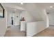 Bright hallway with neutral carpeting leading to multiple rooms at 4996 Cathay Ct, Denver, CO 80249
