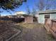 The backyard includes a storage shed, garden beds, and a partially fenced-in yard at 2741 W 134Th Cir, Broomfield, CO 80020