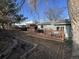 The backyard features a wooden deck with outdoor seating, offering a relaxing space to enjoy the outdoors at 2741 W 134Th Cir, Broomfield, CO 80020