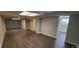 The finished basement has gray walls, brown floors, recessed lighting, and multiple windows at 2741 W 134Th Cir, Broomfield, CO 80020