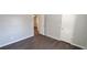 This bedroom features gray walls, brown floors, and white trim around the doors at 2741 W 134Th Cir, Broomfield, CO 80020