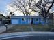 Charming blue home with mature trees, a well-kept lawn, and an attached single car garage at 2741 W 134Th Cir, Broomfield, CO 80020