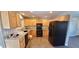 Updated kitchen with stainless steel appliances, granite countertops, and wood cabinets at 2741 W 134Th Cir, Broomfield, CO 80020