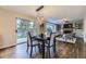 Cozy dining area with sliding glass door leading to the backyard and seamless to living area at 5645 S Himalaya Way, Centennial, CO 80015