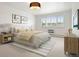 Calming bedroom with natural light, comfortable bed, and tasteful decor at 695 S Alton Way # 9C, Denver, CO 80247