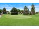 View of a golf putting green on a well maintained course with mature landscaping at 695 S Alton Way # 9C, Denver, CO 80247