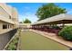Recreational space with bocce ball court and covered seating area with tables at 695 S Alton Way # 9C, Denver, CO 80247