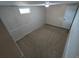Bedroom featuring carpet, a small window, and simple baseboard trim at 6233 W 75Th Ave, Arvada, CO 80003
