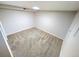 Small bedroom featuring neutral carpet and walls and a compact window at 6233 W 75Th Ave, Arvada, CO 80003