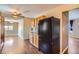 Bright kitchen featuring wooden cabinets, granite countertops, and modern appliances at 6233 W 75Th Ave, Arvada, CO 80003