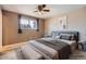 Serene main bedroom retreat features calming wall color, soft textures, and cozy ambiance at 6233 W 75Th Ave, Arvada, CO 80003