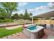 The backyard features a spa, a garden, a patio, and mature landscaping at 841 Beech St, Golden, CO 80401