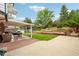 Well manicured backyard featuring a spa, garden and mature landscaping at 841 Beech St, Golden, CO 80401