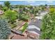 A beautiful backyard with a garden area, a shed, mature trees and well maintained landscaping at 841 Beech St, Golden, CO 80401