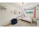Cozy bedroom featuring a plush blue beanbag and whimsical decor at 841 Beech St, Golden, CO 80401