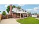 A home with a brick chimney, a covered patio, and a 2 car garage at 841 Beech St, Golden, CO 80401