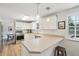 Beautiful updated kitchen featuring stainless appliances and decorative lighting at 841 Beech St, Golden, CO 80401