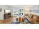 Cozy living room with large windows, hardwood floors, and modern furnishings at 841 Beech St, Golden, CO 80401