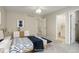 Staged main bedroom showing ensuite bathroom at 6522 S Hoyt Way, Littleton, CO 80123