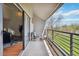Balcony with lake views is an extension of the living space at 10550 W Jewell Ave # 301, Lakewood, CO 80232