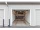 This garage features built-in shelving and cabinets for optimal storage and organization at 10550 W Jewell Ave # 301, Lakewood, CO 80232