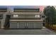 Townhome with attached garages offers convenience and curb appeal at 10550 W Jewell Ave # 301, Lakewood, CO 80232