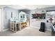 Fun bedroom with lofted bed, a creative play area and display for toy collection at 401 S Ivy St, Denver, CO 80224