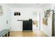 Entryway with storage bench and cabinet for organized living at 401 S Ivy St, Denver, CO 80224