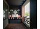 This balcony features wood-look deck tiles and a built in bench at 3420 W 32Nd Ave # 203, Denver, CO 80211