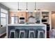 Modern kitchen with a spacious island, stainless steel appliances, and sleek cabinetry, perfect for cooking and entertaining at 3420 W 32Nd Ave # 203, Denver, CO 80211