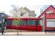 Attractive restaurant exterior with a vibrant red awning and classic architectural details, offering a welcoming ambiance at 3420 W 32Nd Ave # 203, Denver, CO 80211