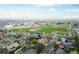 A home located across the street from a green school campus with football and baseball fields at 8079 W 67Th Ave, Arvada, CO 80004