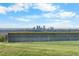 This image shows the skyline and some of the backyard at 8079 W 67Th Ave, Arvada, CO 80004
