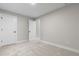 Bright bedroom featuring neutral walls, carpet, and white trim for a clean and comfortable feel at 8079 W 67Th Ave, Arvada, CO 80004