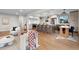 Spacious living area featuring an open floor plan with hardwood floors and plenty of natural light at 8079 W 67Th Ave, Arvada, CO 80004