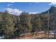 Aerial view of property showing lot in a mountainous area at 5925 Herzman Dr, Evergreen, CO 80439