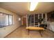 Unfinished basement area with a workbench and shelving unit at 5925 Herzman Dr, Evergreen, CO 80439