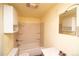 Small bathroom with shower/tub, toilet, and vanity at 5925 Herzman Dr, Evergreen, CO 80439