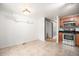 Eat-in kitchen area with ceramic tile floors and modern appliances adjacent to kitchen at 6920 W 48Th Ave, Wheat Ridge, CO 80033