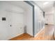 Laundry area with hookups and hardwood floors that also has closet space at 6920 W 48Th Ave, Wheat Ridge, CO 80033