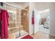 Bathroom with shower, tile flooring and a modern vanity at 7865 Vallagio Ln # 308, Englewood, CO 80112