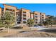 Luxury condo building with balconies and landscaping at 7865 Vallagio Ln # 308, Englewood, CO 80112