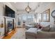 Relaxing living room with fireplace and large windows at 7865 Vallagio Ln # 308, Englewood, CO 80112