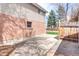 View of the home's backyard and patio area, featuring a privacy fence at 10878 Patterson Ct, Northglenn, CO 80234