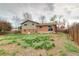 Large backyard with lush greenery, a partially fenced in area, and large trees at 10878 Patterson Ct, Northglenn, CO 80234