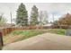 Spacious backyard with a large concrete patio and lush landscaping at 10878 Patterson Ct, Northglenn, CO 80234