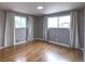 Bedroom features hardwood flooring and lots of natural light at 10878 Patterson Ct, Northglenn, CO 80234