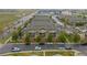 Aerial view of residential townhomes showcasing well-maintained landscaping and green space at 5800 Tower Rd # 610, Denver, CO 80249