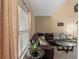 Cozy living room featuring a large sectional and lots of light at 5800 Tower Rd # 610, Denver, CO 80249