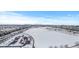 Aerial view of snowy park and residential area with community amenities at 9624 Martin Luther King Blvd, Denver, CO 80238